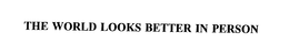 THE WORLD LOOKS BETTER IN PERSON trademark