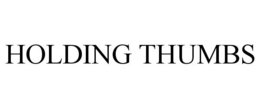 HOLDING THUMBS trademark
