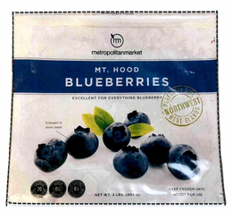 M METROPOLITANMARKET MT. HOOD BLUEBERRIES EXCELLENT FOR EVERYTHING BLUEBERRY PERFECTLY RIPE BEST FLAVOR NORTHWEST ENLARGED TO SHOW DETAIL, CALORIES 70 PER 1 CUP SERVING SODIUM 0G NATURALLY DIETARY FIBER 4G PER 1 CUP SERVING NET WT. 2 LBS. (907 G) KEEP FROZEN UNTIL READY FOR USE trademark