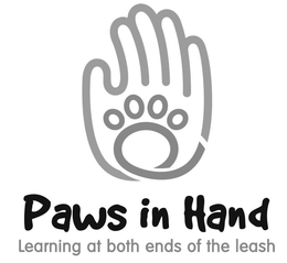 PAWS IN HAND LEARNING AT BOTH ENDS OF THE LEASH trademark