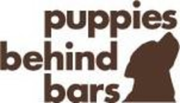 PUPPIES BEHIND BARS trademark