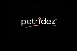 PETRIDEZ WITH A ANIMAL PAW THAT IS PINK ON THE I IN THE WORD RIDEZ WITH A PINK LINE UNDER THE NAME trademark